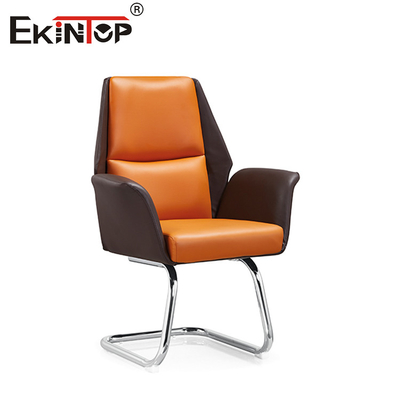 Chaise en cuir orange et marron à dos haut rembourré à hauteur réglable